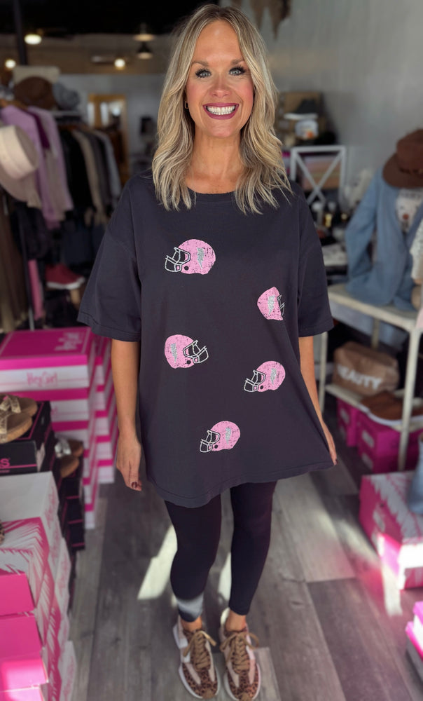 black woman wearing a football helmet Black Football Helmet Oversized Tee – The Paisley Prairie Boutique