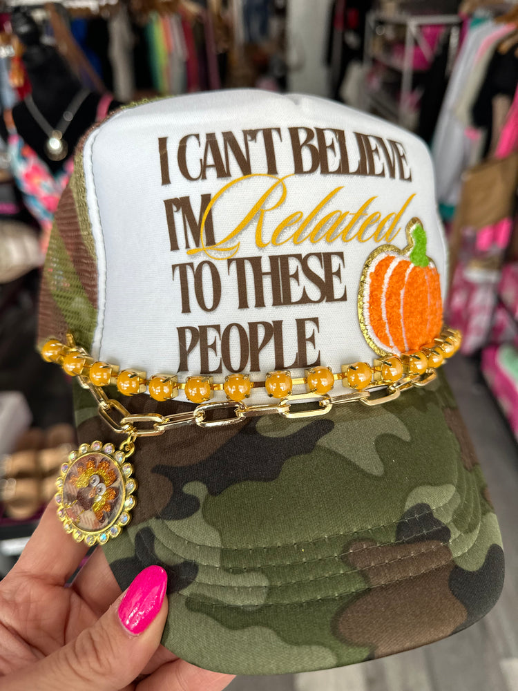 I Can’t Believe I’m Related to These People Camo Trucker Hat (Fall Edition)